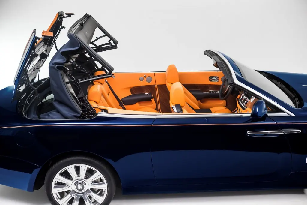 The Rolls-Royce Dawn's roof closes in 22 seconds of silent ballet.