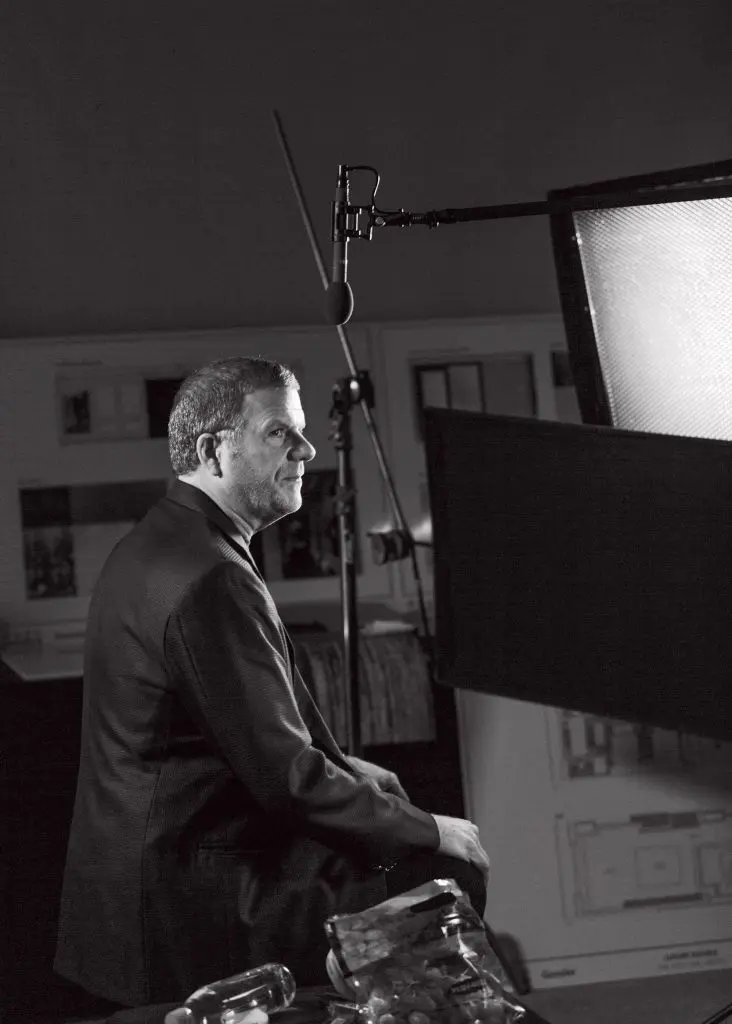 Tilman Feritta does touch-ups for his new TV show. (Photo by Max Burkhalter)