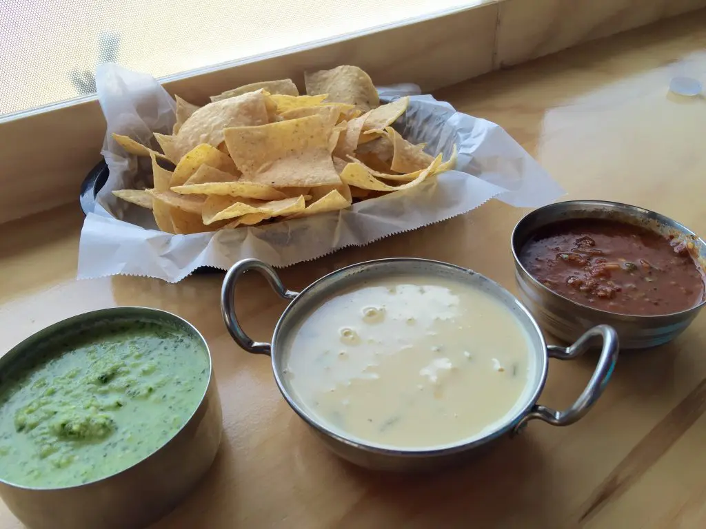 A lunch or dinner must-have selection: queso blanco, salso roja, and green crack. 