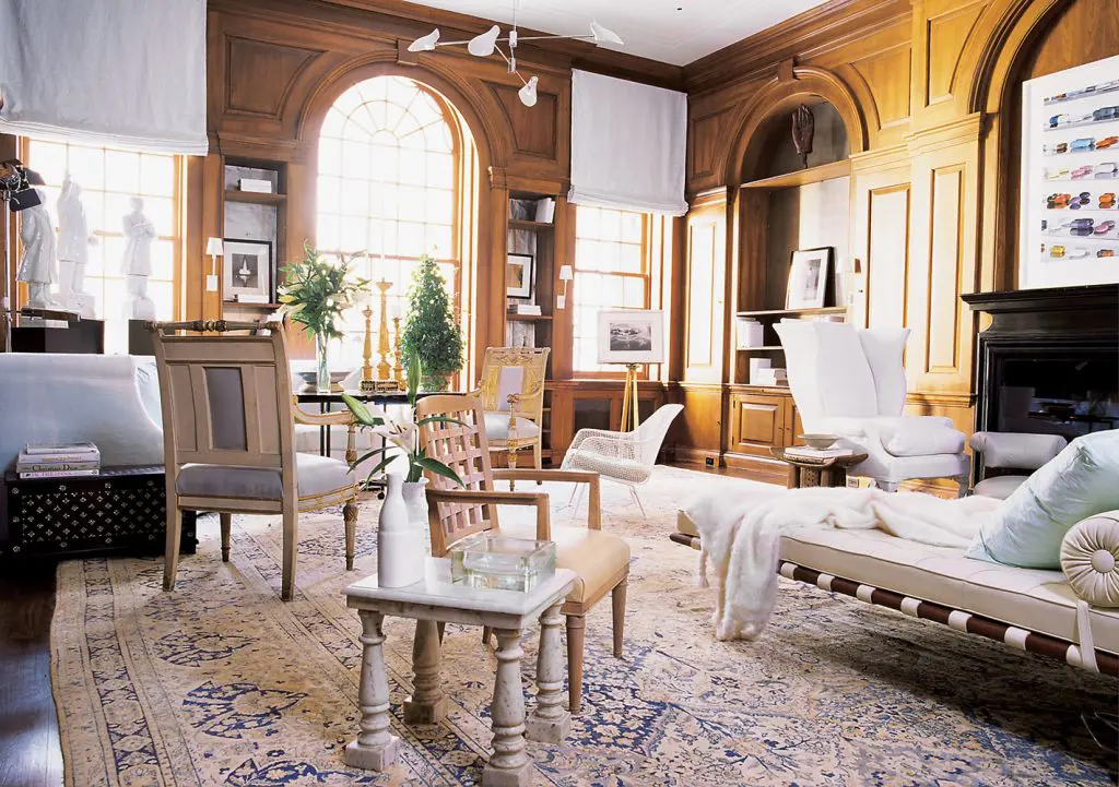 A spontaneous-looking arrangement of shapely white furniture
