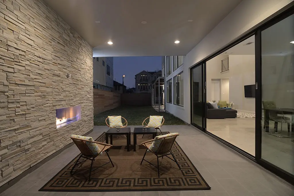 Outdoor spaces are designed to be showpieces at John Leggett's homes.