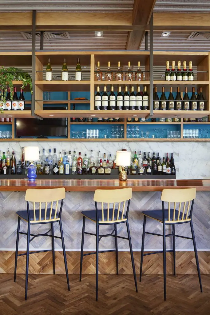 The drink menu features custom cocktails and a selection of red, white and rosé wines, plus a wide range of beers and saké.