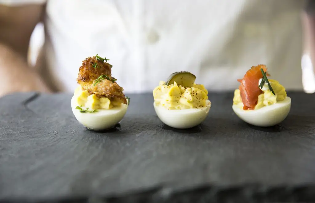 Start your meal with a trio of deviled eggs. 