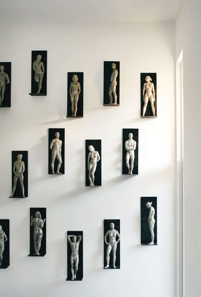 Fourteen cast-resin sculptures from Christopher Smith's "Perfectly Naked" series. 