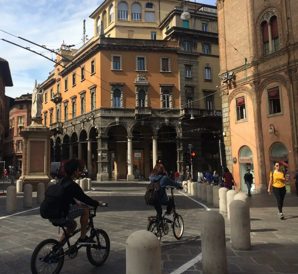 Vibrant street scene in Bologna.