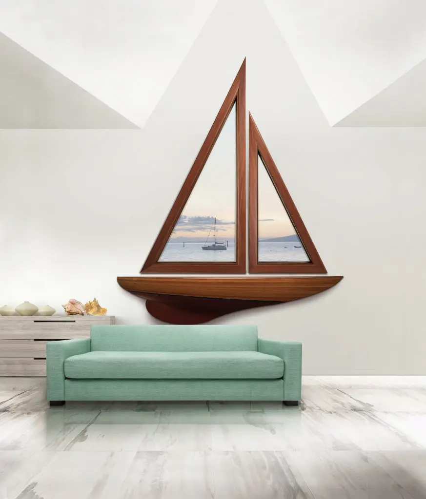 Andersen® E-Series trianglur picture windows in mahogany with a cinnamon interior ﬁnish and custom-designed angles can bring any custom dream to life.