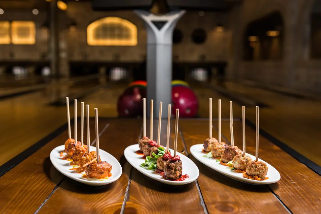 A trio of meatballs — meatloaf, pork and beans, and buffalo chicken. 