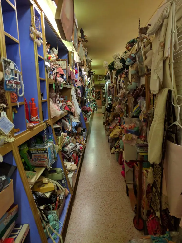 The aisle where a ghost places a single children's toy at night.