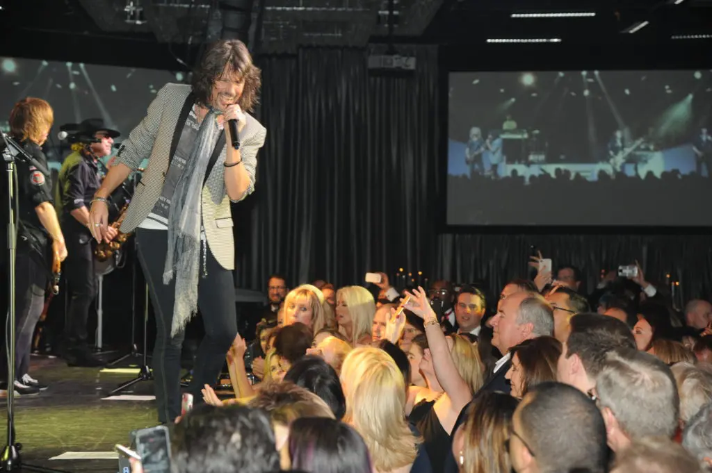 Houston’s Billionaire Tycoon, Carlos Correa and a Top Rock Band Party Together — and the Money Rolls in for the Kids