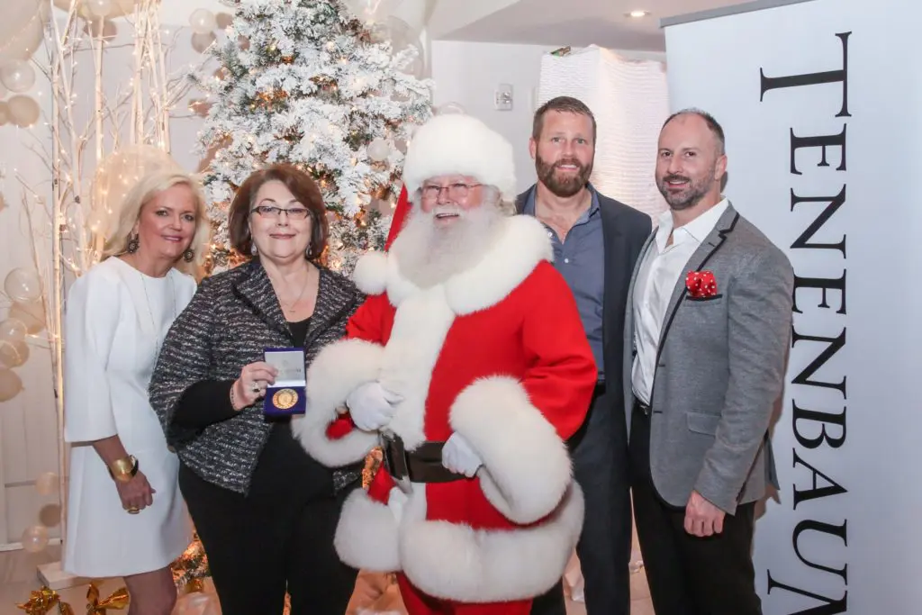 Santa Baby and Sacks of Bling Give This Holiday Schmooze Big Money Cheer
