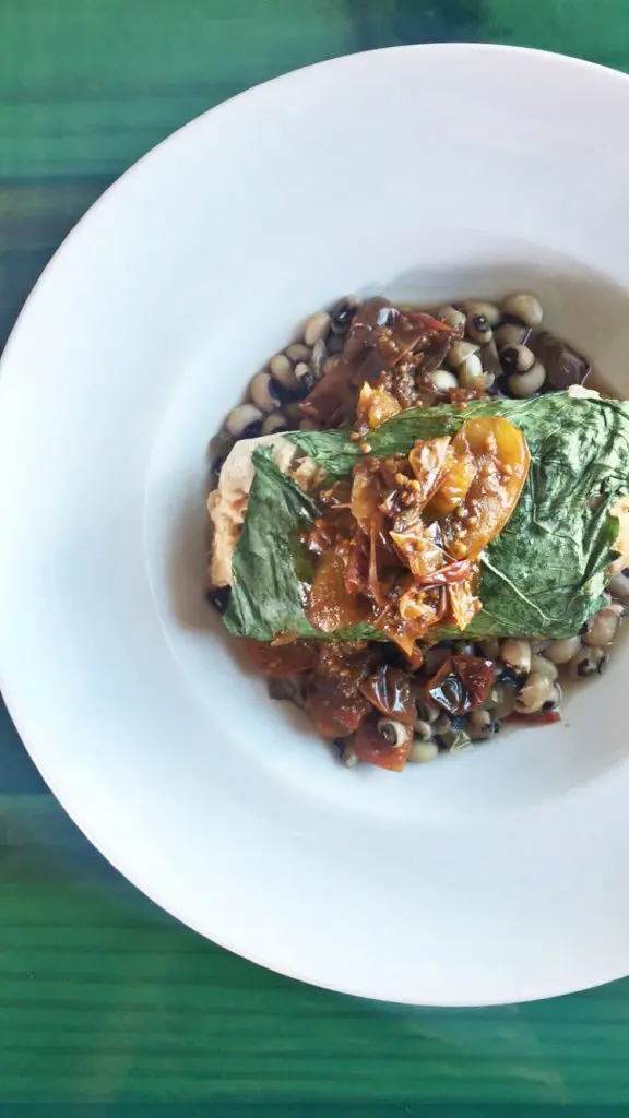 At Harold's In The Heights, feast on blue crab-stuffed Gulf fish served with black eyed peas, house-made tasso ragout and tomato jam. 