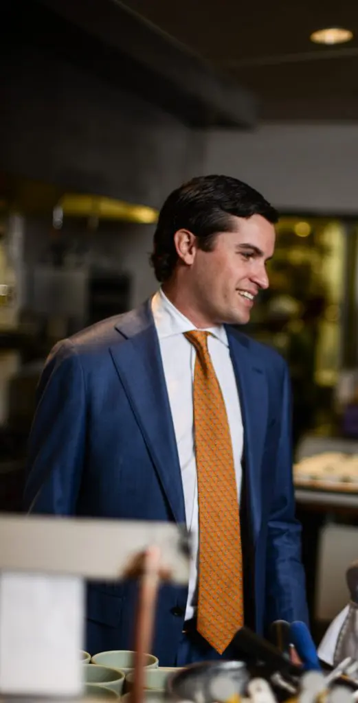André Dowd in the kitchen of his mother's restaurant, Rise No. 1