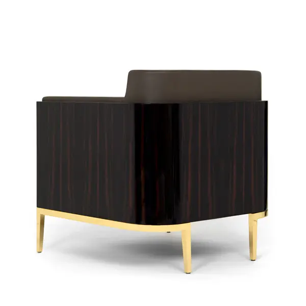 Shelter armchair
in macassar ebony and brass