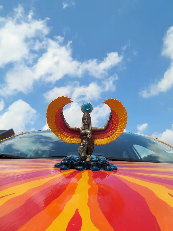 Phoenix Rising art car’s hood ornament – the Goddess Isis — was a talisman along the way. 