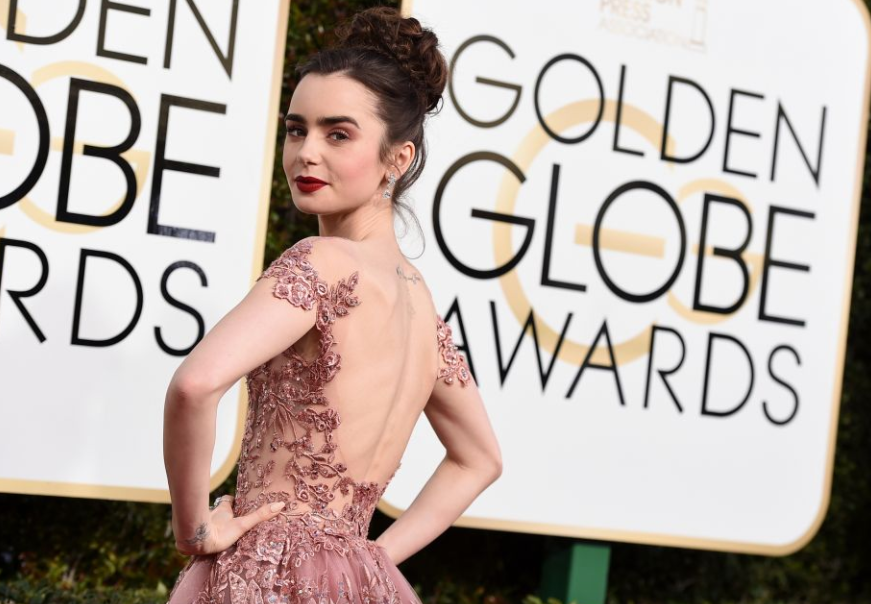Lily Collins brings fairytale to the red carpet in Zuhair Murad. 