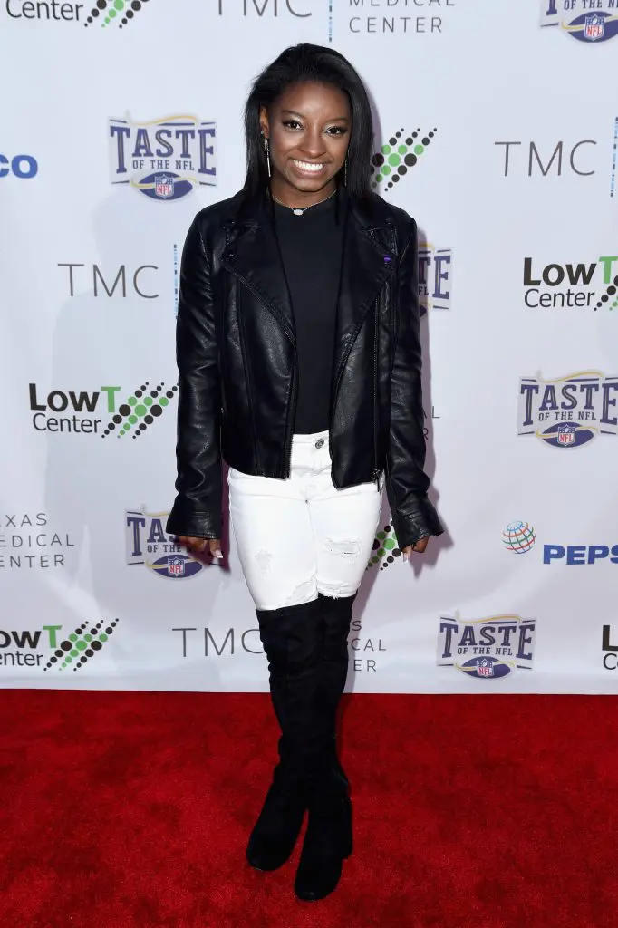 HOUSTON, TX - FEBRUARY 04:  Olympic gymnast Simone Biles attends the Taste Of The NFL 'Party With A Purpose' at Houston University on February 4, 2017 in Houston. at University of Houston on February 4, 2017 in Houston, Texas.  (Photo by Nicholas Hunt/Getty Images for Taste Of The NFL)