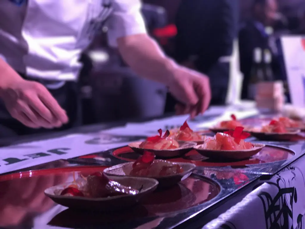Nobu 57 chef Taku Sato and the New York Jets' salmon pastrami with yuzu honey mustard (Photo by Jailyn Marcel) 