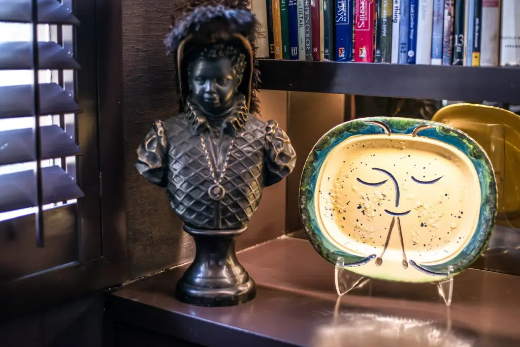 Bronze bust from Round Top. Picasso plate.