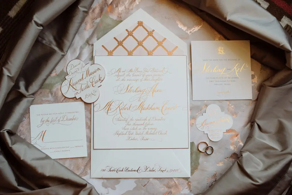 Rose gold took over the lavish affair, starting with the wedding invitations. 