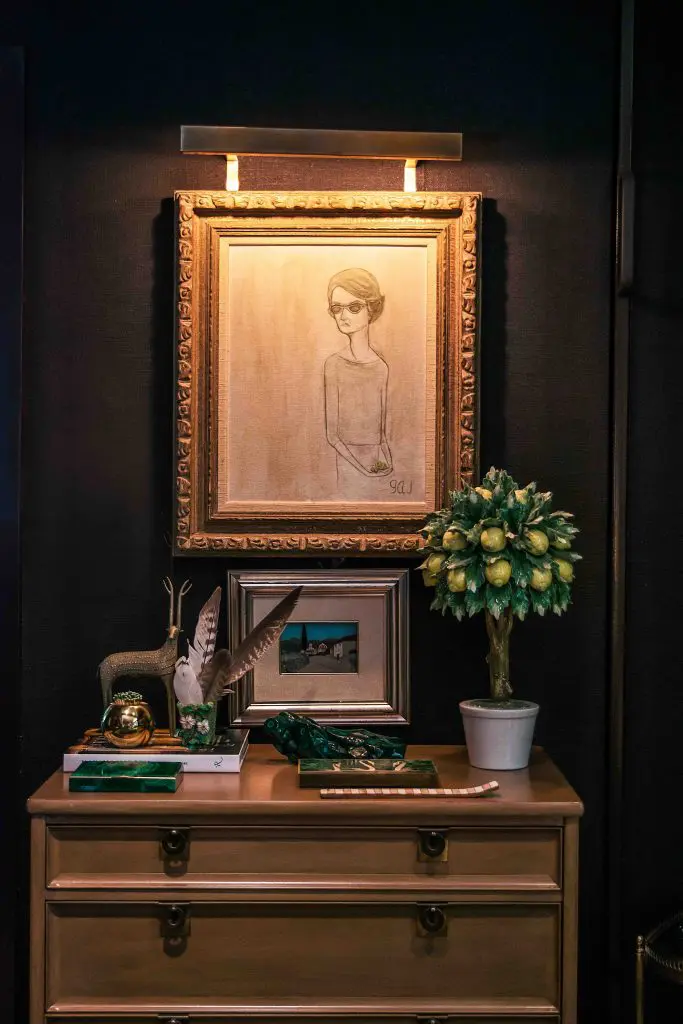 Genevieve Jones self-portrait, circa 1960. Malachite and silver Taxco box, a gift from Mackay Boynton. Ceramic lemon tree and framed mosaic from Florence. (Photo by Shayna Fontana)