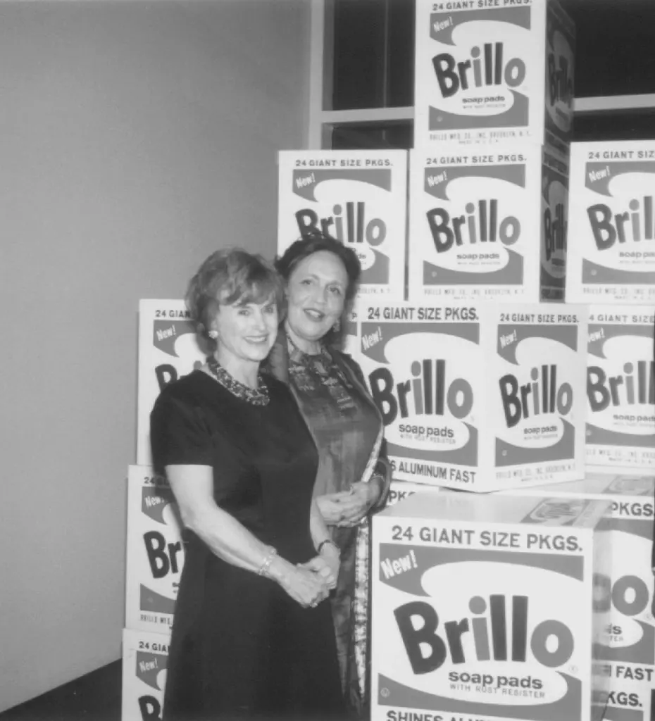 Nancy Allen and Marilyn Oshman admire a stack of Warhol Brillo boxes during the 2001 gala, the museum's first, which coincided with a major Pop U.K/U.S.A. survey. (Photo Phyllis Hand) 