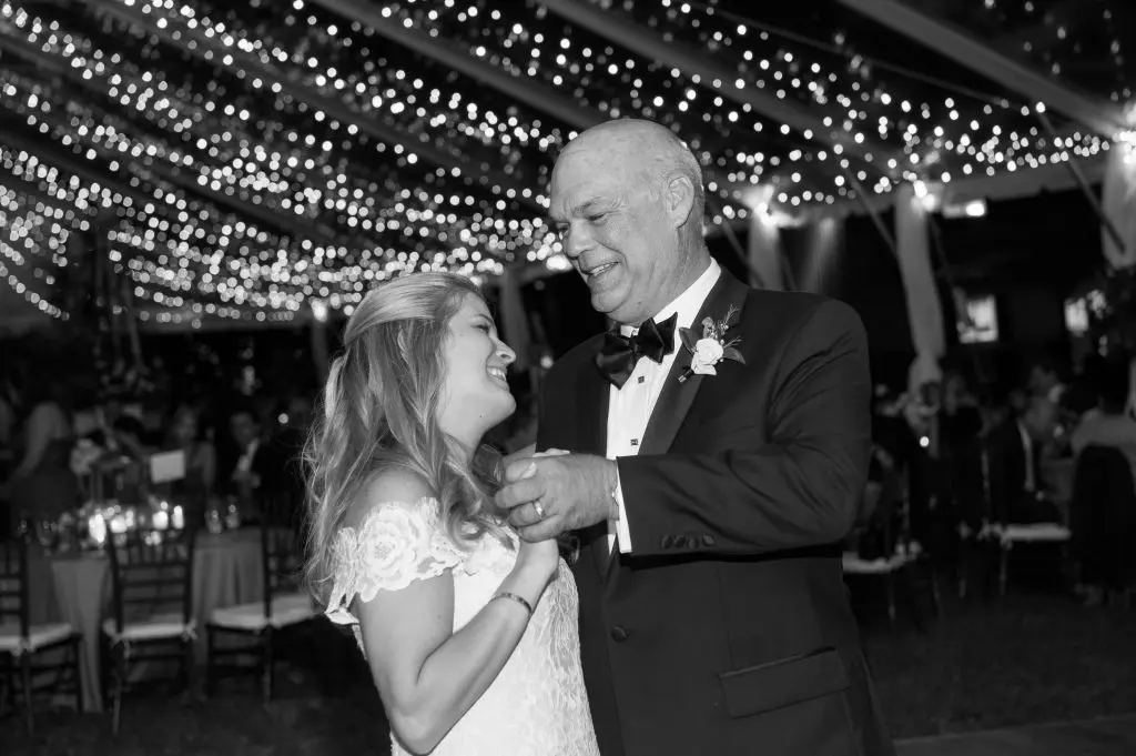 The bride and dad, Mike Rutherford Jr., take a twirl on the dance floor.