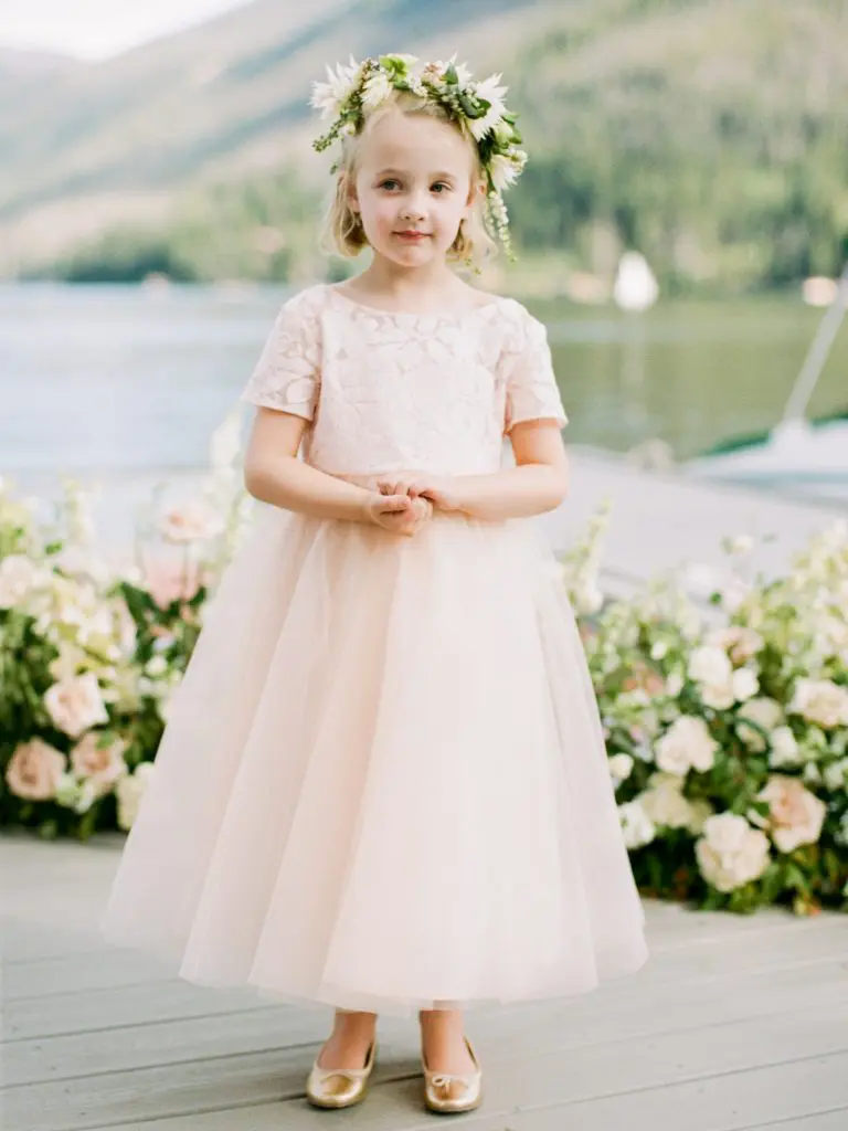 A flower girl in her Bows & Arrows flower crown (Photo by Rachel Havel)