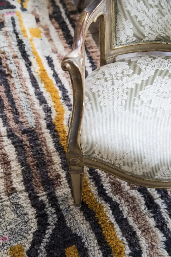 Vintage Moroccan rug with late-18th-century Venetian chair