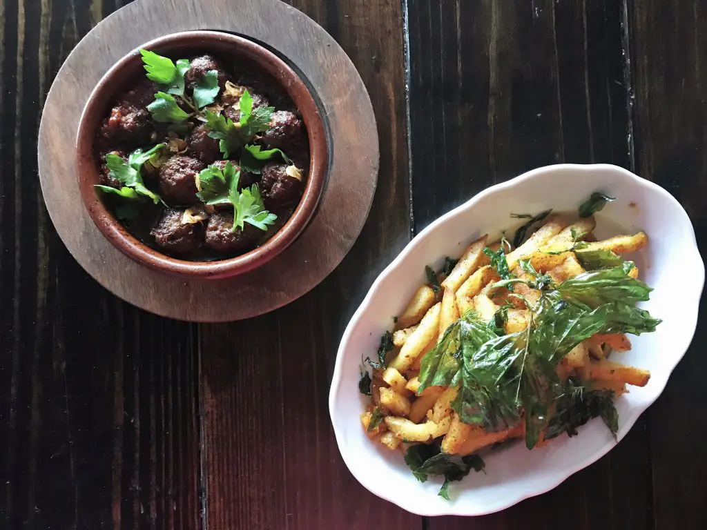 Delicate meatballs and Greek fries at the new Helen in the Heights. 