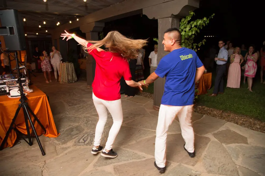 Salsa dancing on full display featuring Strictly Street Salsa at a Memorial Park Urban Green fundraiser. You might want to try salsa at home for it physical and mental health benefits.