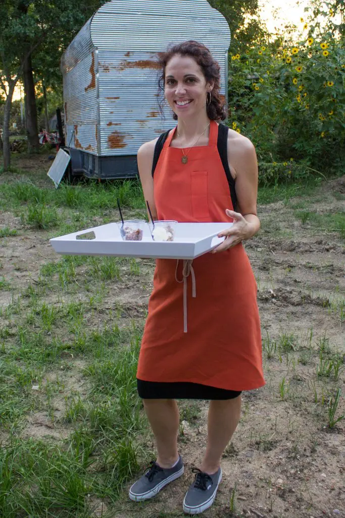 Becca Reyenga of Eat My Pralines passes her praline bread pudding.