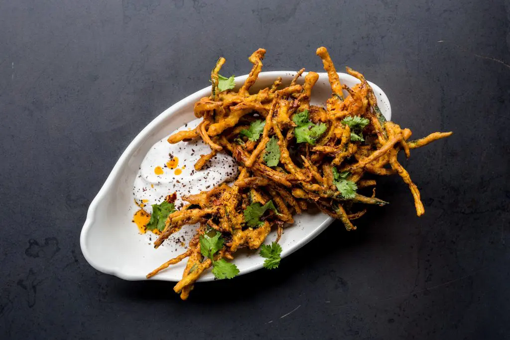 Start your meal with the squash fritters at Alice Blue. 