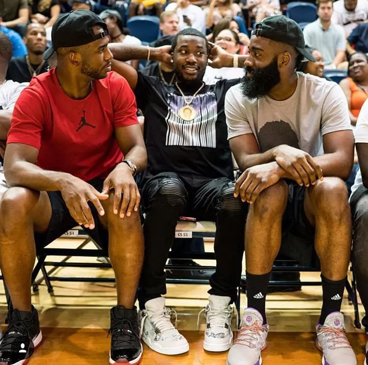 James Harden, rapper Meek Mill and Chris Paul enjoy a moment on Saturday.