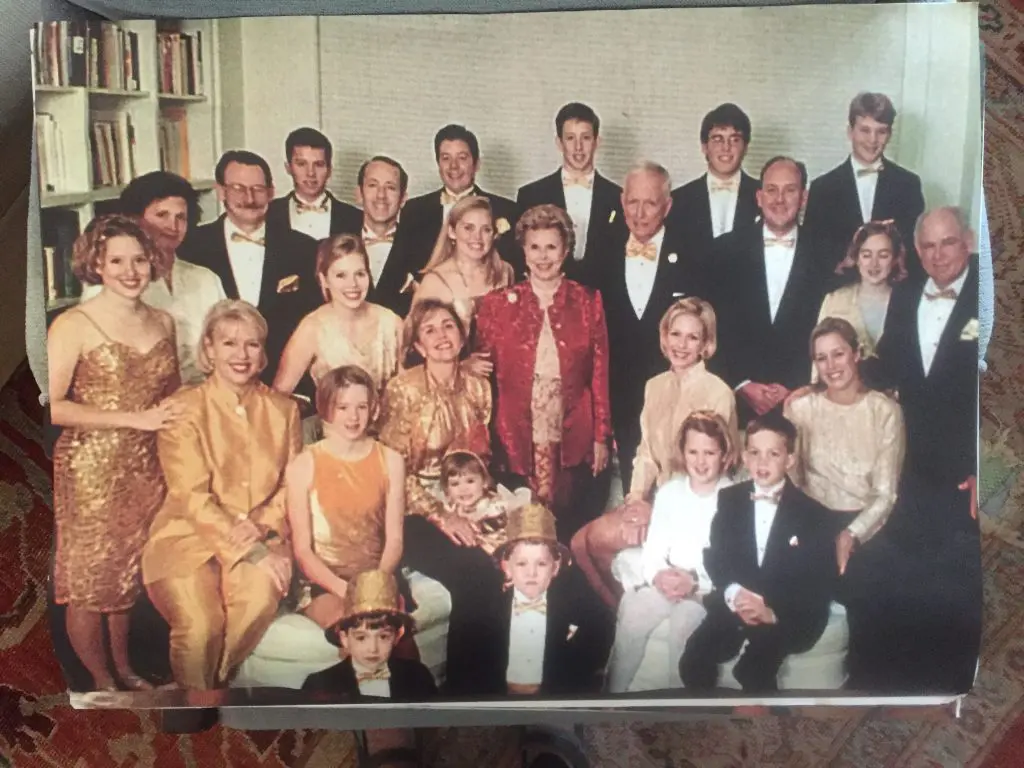 At the golden anniversary of Louise and Denton Cooley, surrounded by children, grandchildren, and great-grandchildren. 