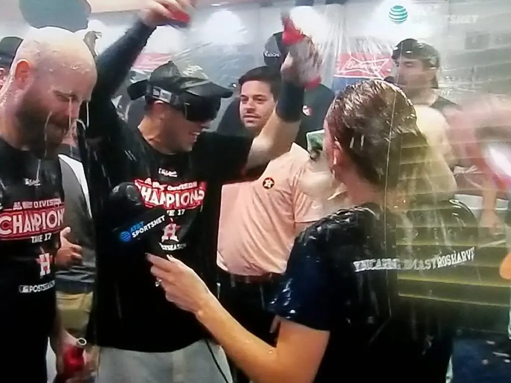 Houston Astros' division clinch day brought champagne and Budweiser showers — and a sweet Justin Verlander and Kate Upton kiss.