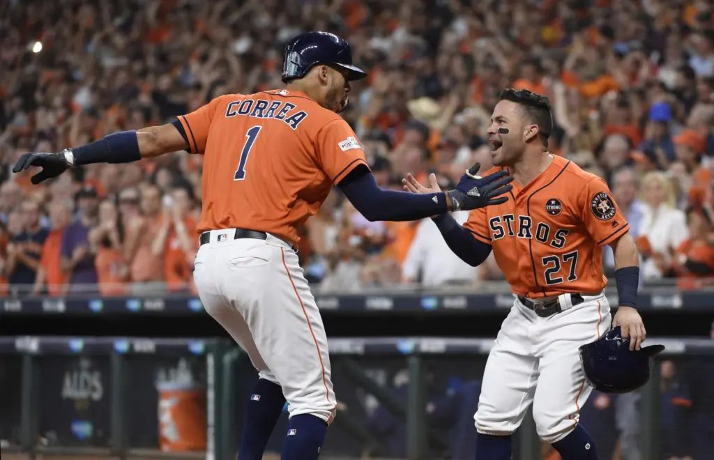 Carlos Correa made sure the Boston Red Sox paid for walking Jose Altuve.