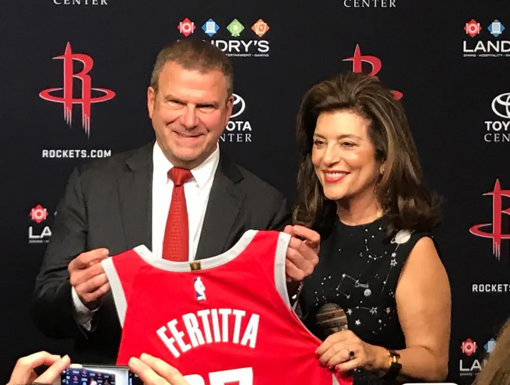 Tilman Fertitta and his long-time publicist Dancie Ware celebrate the moment. (Photo by Mary Ann Cuellar.)