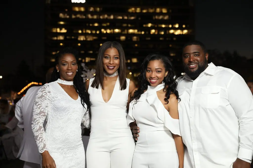 Attendees Niya Key, Tiffany Monique, Zach Haynes and friend posing for the camera at Le Dîner en Blanc - Houston 2017