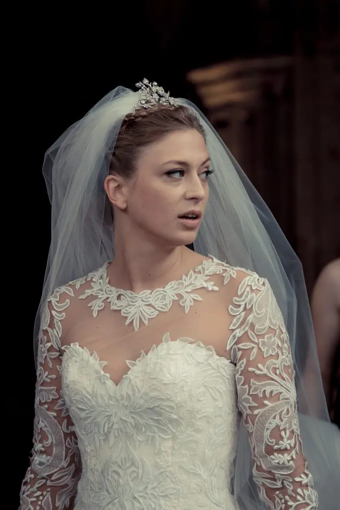 Equally for aesthetics and security purposes, Tatiana's grandmother Archduchess Anna Maria Gabriela of Austria’s tiara was woven into a braid atop Tatiana’s head.