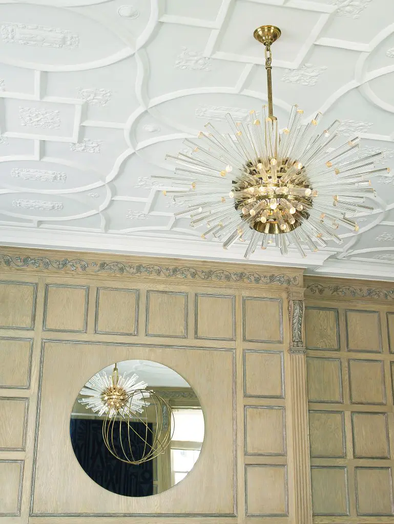 Bakalowits & Sohne chandelier from Bernd Goeckler Antiques, New York. Mirrored wall sculpture, Olafur Eliasson’s Your Orbit Attention, 2013.