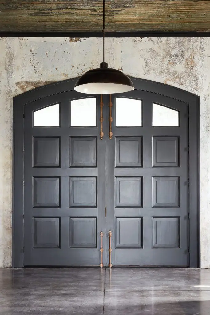 Custom doors inspired by vintage doors at the Houston Fire Museum. Vintage lighting, circa 1910. 