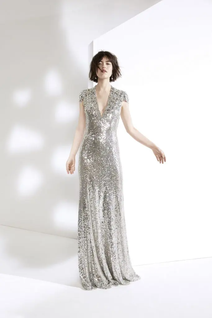 Jenny Packham silver embellished sequin gown with statement shoulders.
