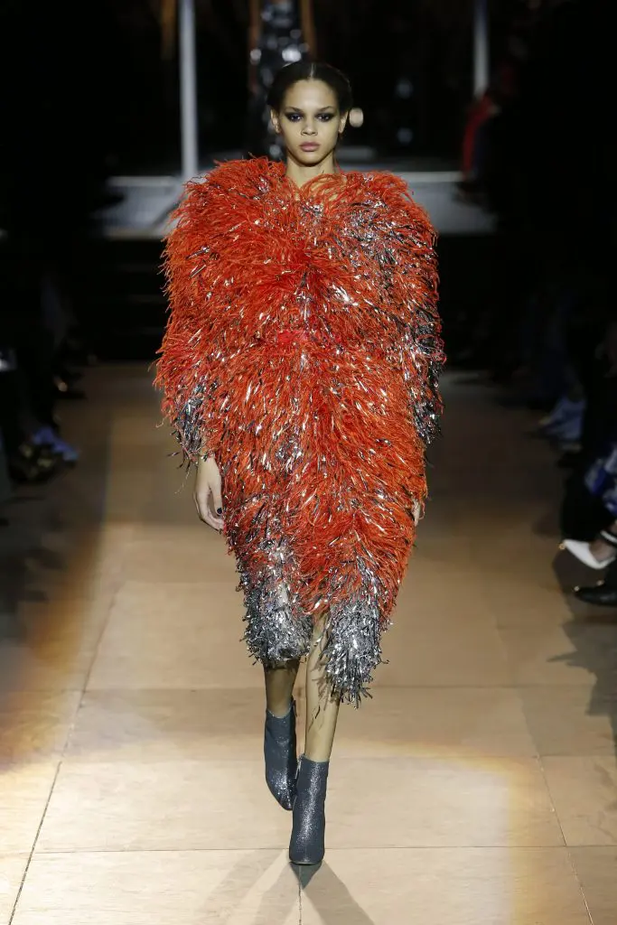 Carolina Herrera orange and silver shaggy coat.