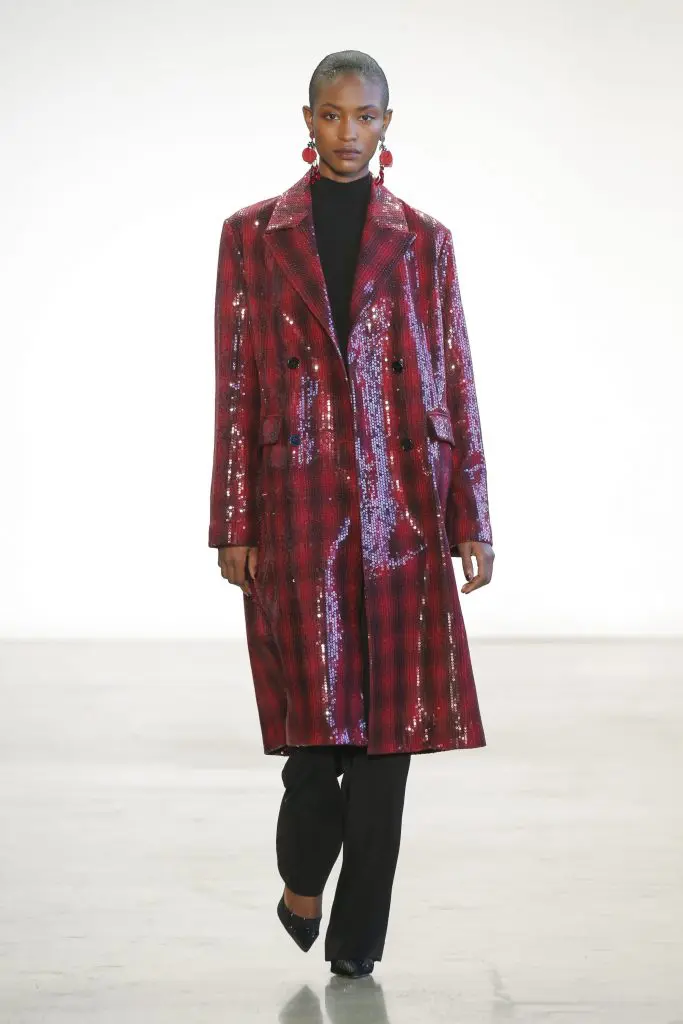 Badgley Mischka ruby/ebony sequined plaid wool coat, ebony cashmere turtleneck, and ebony crepe pant.