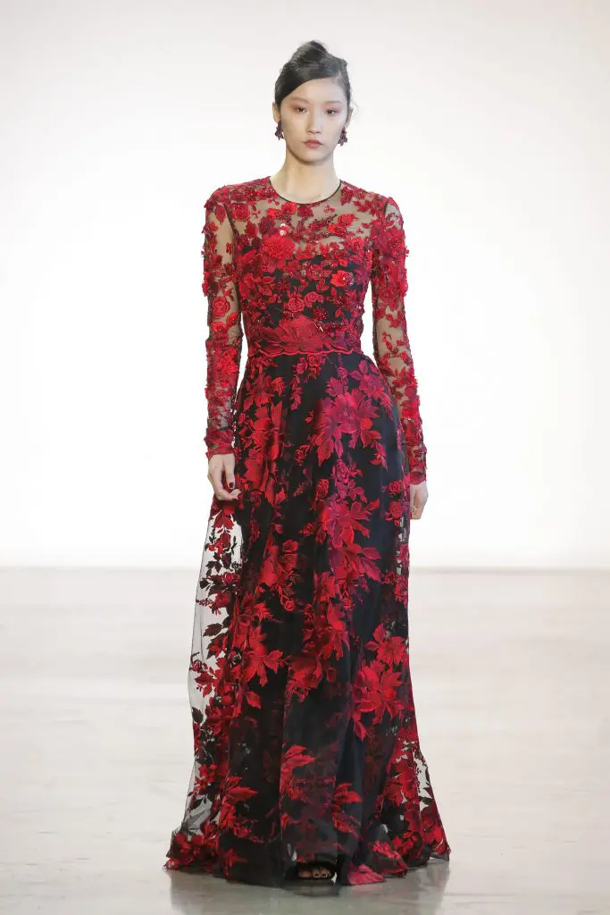 Badgley Mischka lace and tulle gown with embroidered illusion overlay. 
