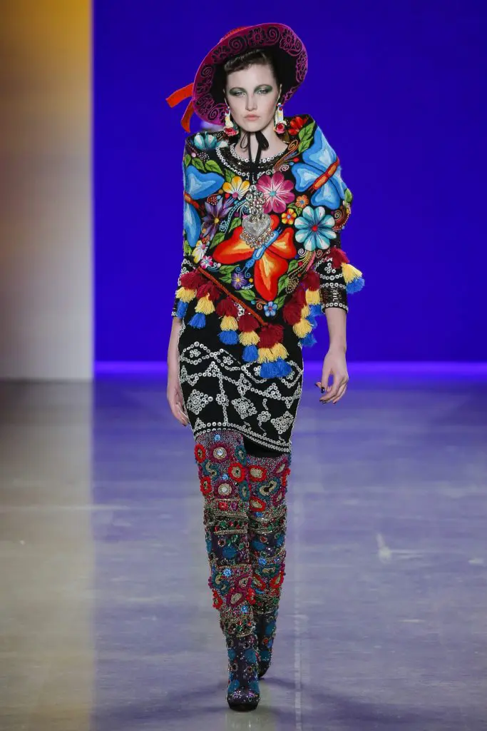 Naeem Khan embroidered mother of pearl button dress with floral silk shawl.