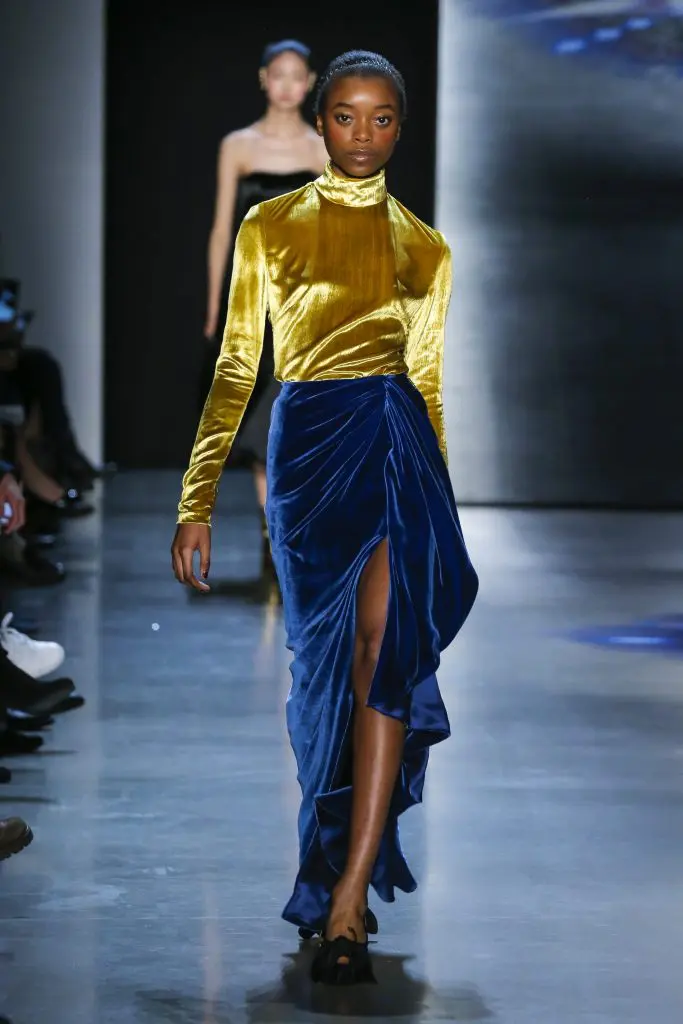 Prabal Gurung gold panne velvet long sleeve turtleneck bodysuit, midnight panne velvet sarong draped floor-length skirt.