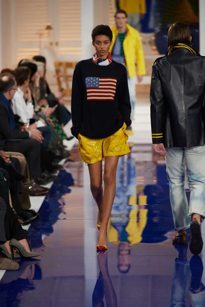 Ralph Lauren canary yellow performance outerwear short, navy American flag cashmere crewneck sweater,yellow and red canvas pump.