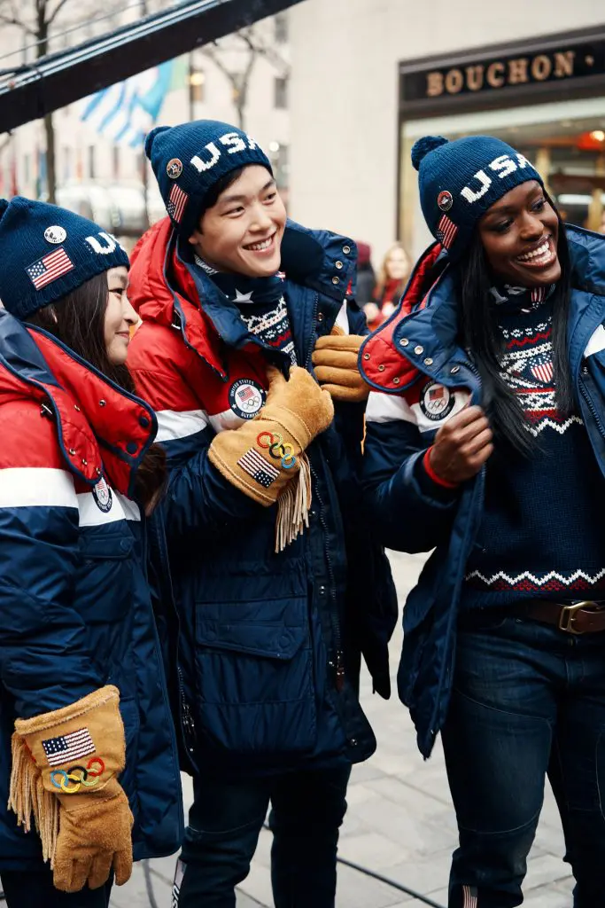 Ice dancers Maia and Alex Shibutani and bobsleder Aja Evans model Ralph Lauren heated jackets and fringe gloves.
