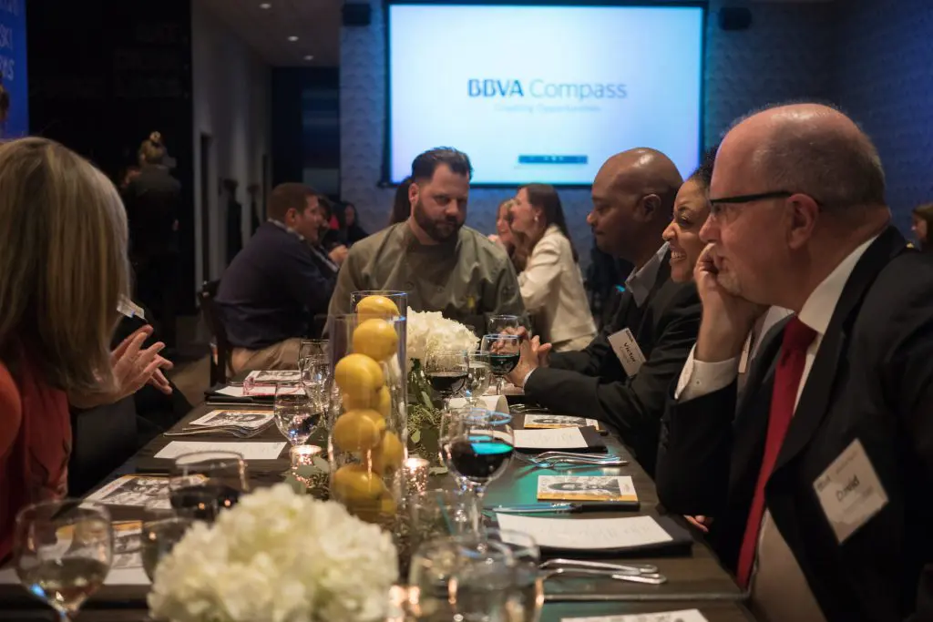 Café Momentum founder Chad Houser with BBVA Compass guests.